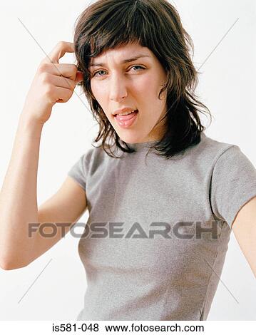 Confused looking woman View Large Photo Image Stock Photo - Confused looking woman. Fotosearch