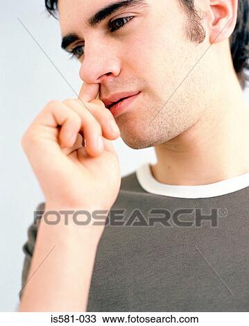 Man picking his nose View Large Photo Image Stock Image - Man picking his nose. Fotosearch