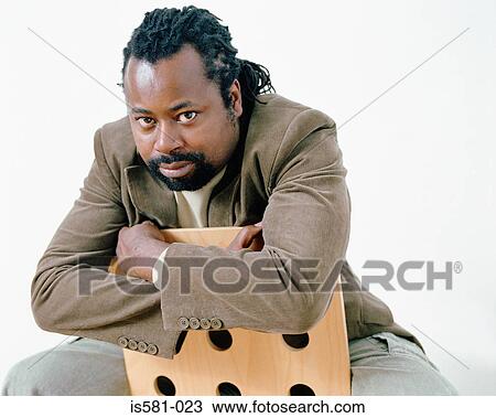 Stock Image - Serious looking man. Fotosearch