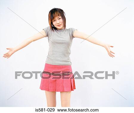 Smiling woman with arms open View Large Photo Image Stock Photo - Smiling woman with arms open. Fotosearch