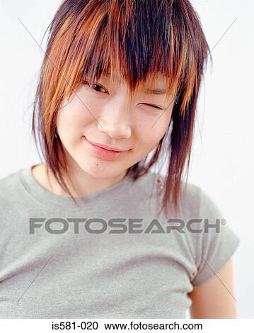 Woman winking View Large Photo Image Stock Image - Woman winking. Fotosearch