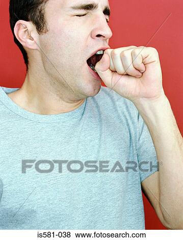 Yawning man View Large Photo Image Stock Photo - Yawning man. Fotosearch
