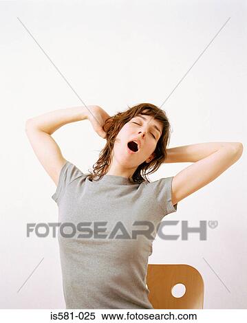 Yawning woman View Large Photo Image Stock Photography - Yawning woman. Fotosearch
