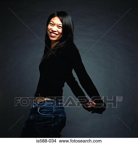 Portrait of a smiling woman View Large Photo Image Picture - Portrait of a smiling woman. Fotosearch