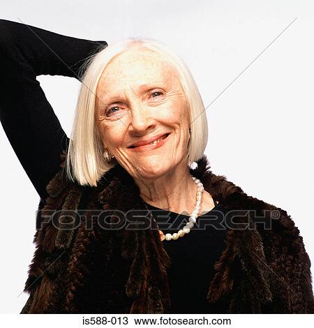 Stock Image - Portrait of an elderly woman. Fotosearch
