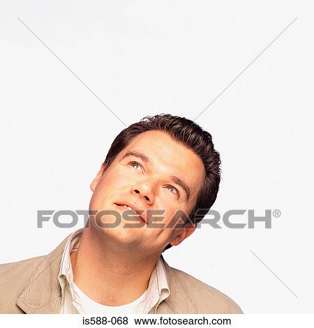 Stock Photo - Thoughtful looking man. Fotosearch