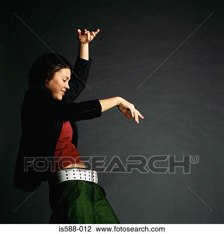Young woman dancing View Large Photo Image Stock Image - Young woman dancing. Fotosearch