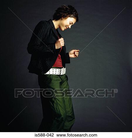 Stock Image - Young woman dancing. Fotosearch