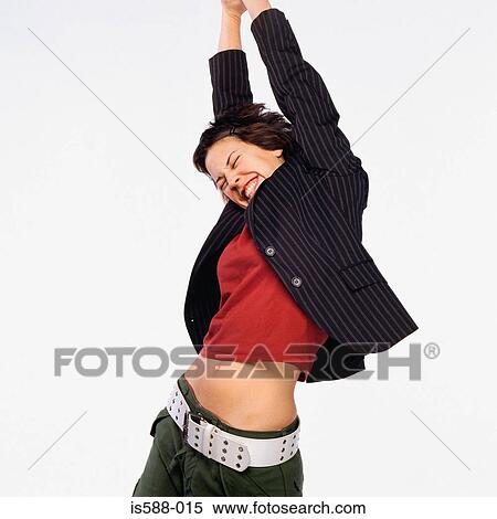 Stock Photography - Young woman stretching. Fotosearch