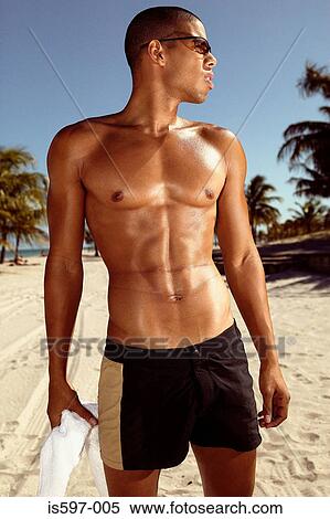 Muscular man on beach View Large Photo Image Stock Photography - Muscular man on beach. Fotosearch