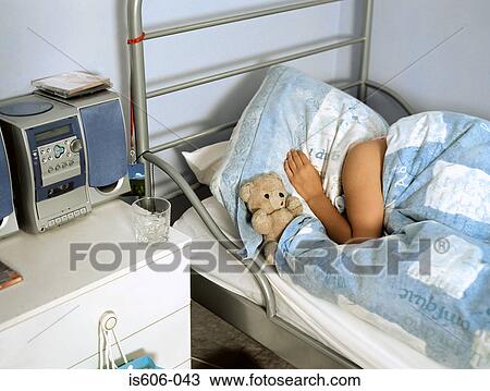 Girl sleeping in bed View Large Photo Image Stock Image - Girl sleeping in bed. Fotosearch