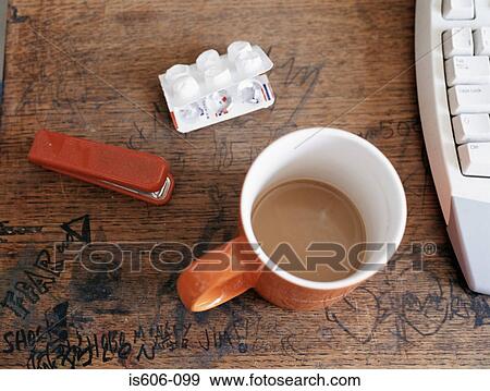 Graffiti and coffee cup on desk View Large Photo Image Stock Photo - Graffiti and coffee cup on desk. Fotosearch