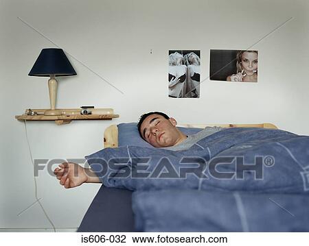 Teenage boy sleeping View Large Photo Image Stock Image - Teenage boy sleeping. Fotosearch