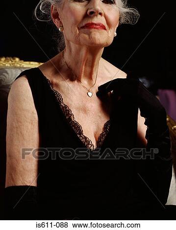 Glamorous senior woman View Large Photo Image Stock Photo - Glamorous senior woman . Fotosearch