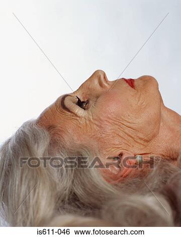 Headshot of glamorous senior woman View Large Photo Image Stock Photograph - Headshot of glamorous senior woman. Fotosearch
