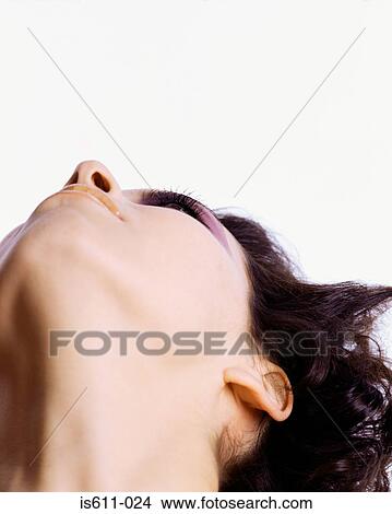 Low angle view of young woman View Large Photo Image Picture - Low angle view of young woman. Fotosearch