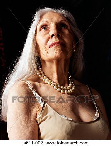 Senior woman looking mirror View Large Photo Image Stock Image - Senior woman looking mirror. Fotosearch