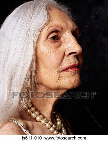 Senior woman looking serious View Large Photo Image Stock Image - Senior woman looking serious. Fotosearch