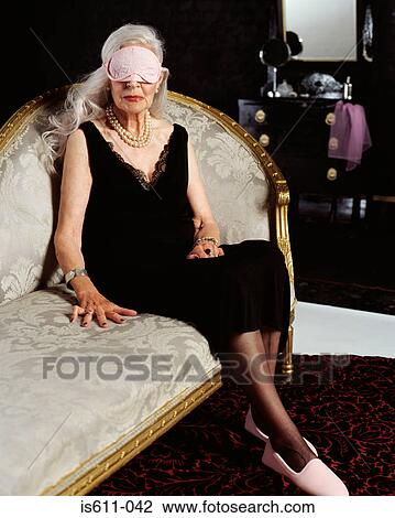 Senior woman wearing eye mask View Large Photo Image Stock Image - Senior woman wearing eye mask. Fotosearch