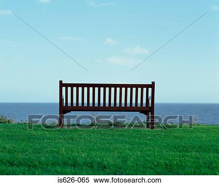 A bench by the sea View Large Photo Image Stock Photography - A bench by the sea. Fotosearch