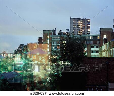 A city at dusk View Large Photo Image Stock Photo - A city at dusk. Fotosearch