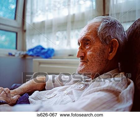 Elderly man in armchair View Large Photo Image Stock Photo - Elderly man in armchair. Fotosearch