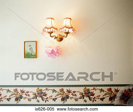 Stock Photography - Lamp and painting on wall. Fotosearch