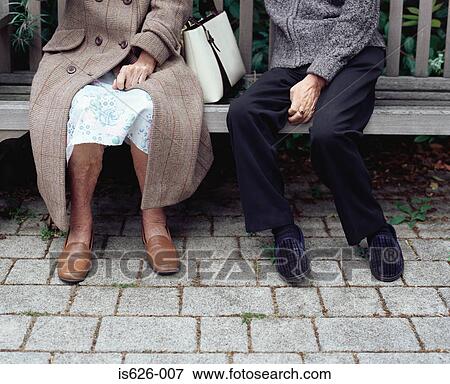 Senior couple on a bench View Large Photo Image Stock Photo - Senior couple on a bench. Fotosearch