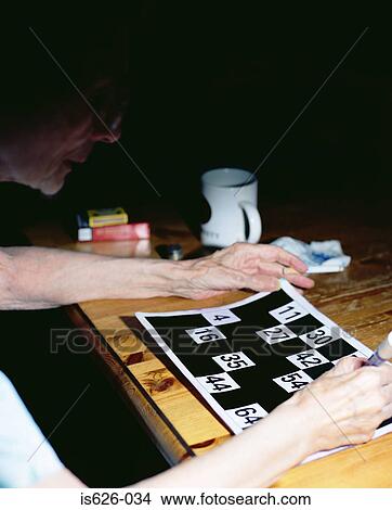 Woman playing bingo View Large Photo Image Picture - Woman playing bingo. Fotosearch