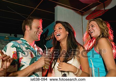 Flirting in a bar View Large Photo Image Picture - Flirting in a bar. Fotosearch