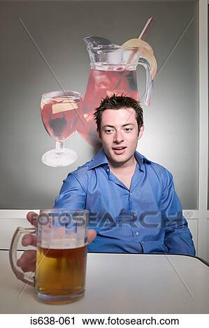 Man reaching for beer glass View Large Photo Image Stock Image - Man reaching for beer glass. Fotosearch