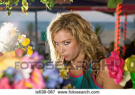 Young woman sucking straw View Large Photo Image Stock Photo - Young woman sucking straw. Fotosearch