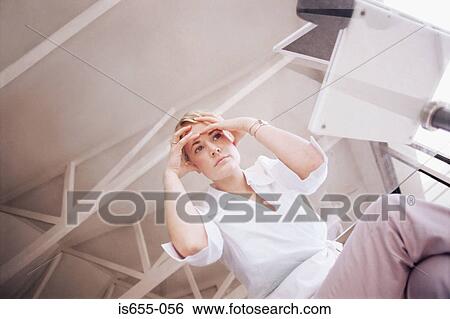 Woman looking stressed View Large Photo Image Stock Photograph - Woman looking stressed. Fotosearch
