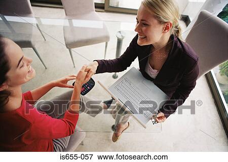 Stock Photo - Woman meeting financial adviser. Fotosearch