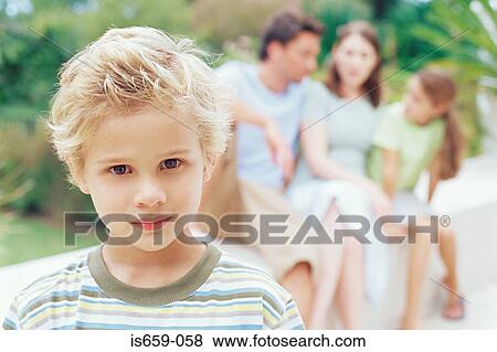 Boy and his family View Large Photo Image Stock Photo - Boy and his family. Fotosearch