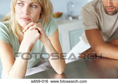 Couple in the kitchen View Large Photo Image Stock Photograph - Couple in the kitchen. Fotosearch