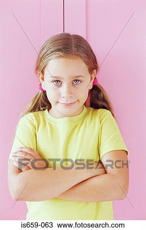 Girl in a yellow t-shirt View Large Photo Image Stock Image - Girl in a yellow t-shirt. Fotosearch