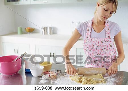 Stock Photo - Woman making biscuits. Fotosearch