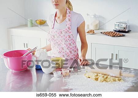 Woman preparing to make biscuits View Large Photo Image Stock Photography - Woman preparing to make biscuits. Fotosearch