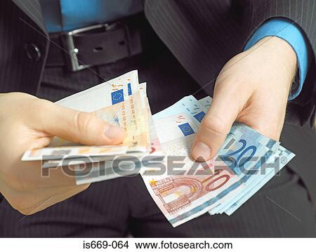 Businessman counting Euro notes View Large Photo Image Picture - Businessman counting Euro notes. Fotosearch