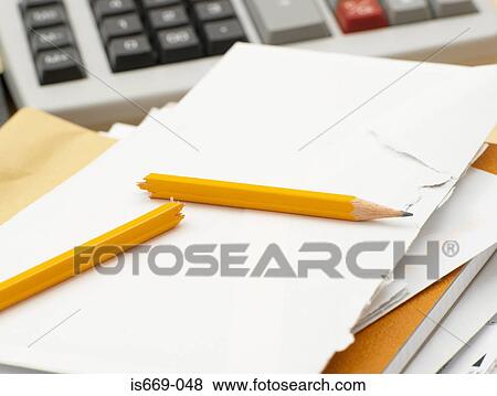 Calculator paper and broken pencil View Large Photo Image Stock Photo - Calculator paper and broken pencil. Fotosearch