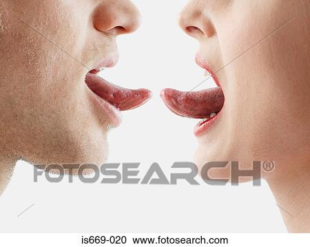 Couple about to touch tongues View Large Photo Image Stock Image - Couple about to touch tongues. Fotosearch