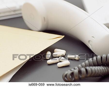 Drugs by a telephone receiver View Large Photo Image Stock Photo - Drugs by a telephone receiver. Fotosearch