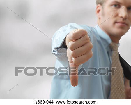 Picture - Man giving thumbs down. Fotosearch