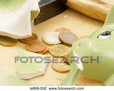 Stock Image - Smashed piggy bank. Fotosearch