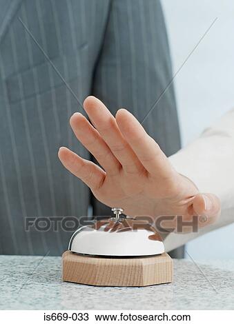 Someone about to ring a counter bell View Large Photo Image Stock Image - Someone about to ring a counter bell. Fotosearch