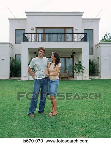 Couple in the garden View Large Photo Image Stock Image - Couple in the garden. Fotosearch