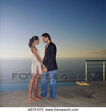 Couple gazing into each other's eyes View Large Photo Image Stock Image - Couple gazing into each other's eyes. Fotosearch
