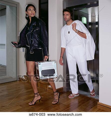 Couple in hotel corridor View Large Photo Image Stock Image - Couple in hotel corridor. Fotosearch