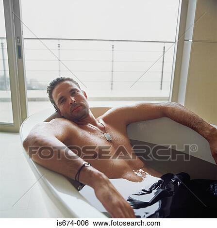 Man in the bathtub View Large Photo Image Stock Photograph - Man in the bathtub. Fotosearch